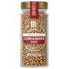 A glass jar of McCormick Gourmet Organic Coriander Seed.