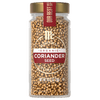 A glass jar of McCormick Gourmet Organic Coriander Seed.