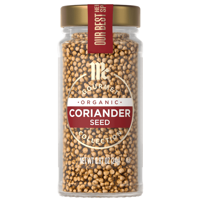 A glass jar of McCormick Gourmet Organic Coriander Seed.