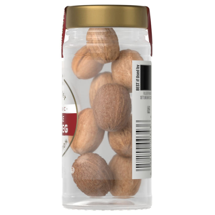 A jar of McCormick whole nutmegs.