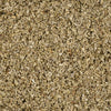 A close-up of wood shavings, likely used for animal bedding or landscaping.