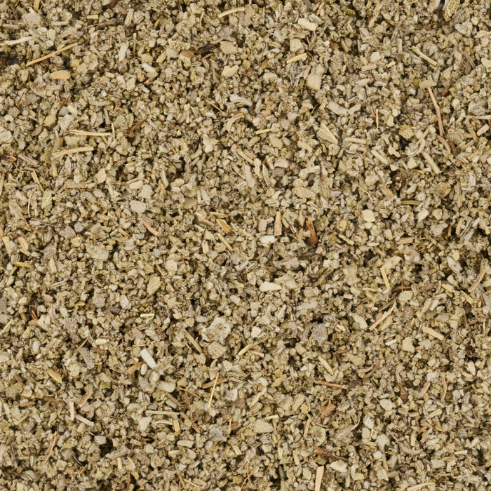 A close-up of wood shavings, likely used for animal bedding or landscaping.