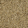 A close-up of wood shavings, likely used for animal bedding or landscaping.
