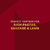 This image promotes the wine as a perfect partner for rich pastas, sausage, and lamb.
