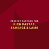 This image promotes the wine as a perfect partner for rich pastas, sausage, and lamb.