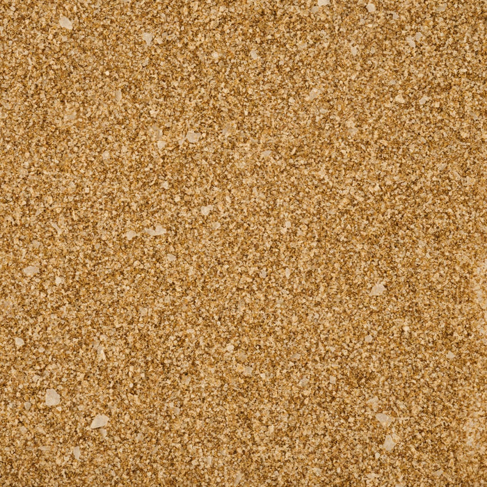 A close-up texture of brown sugar granules.