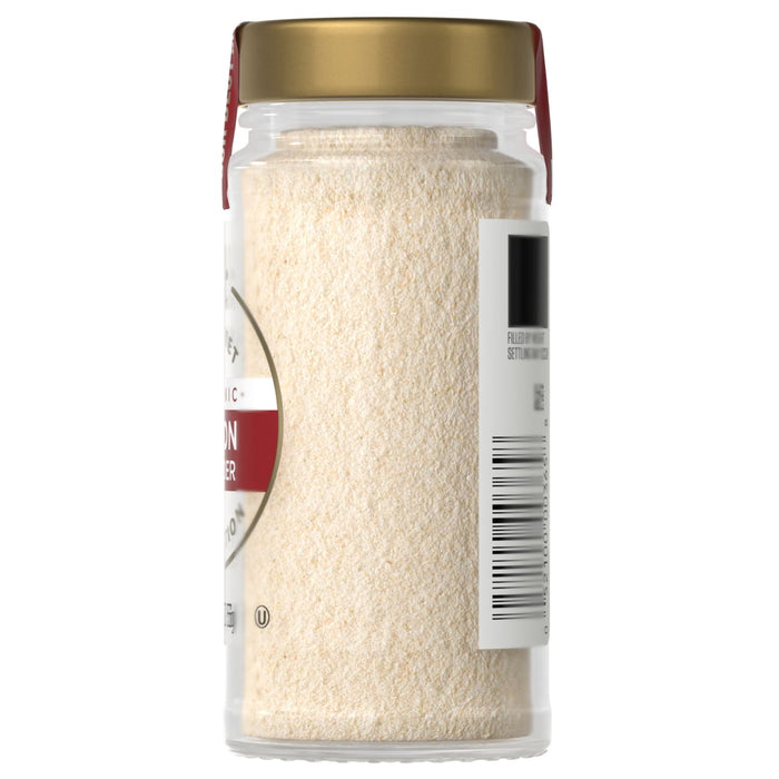 A jar of McCormick Garlic Powder is shown, likely used for seasoning food.
