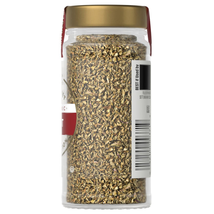 A jar of McCormick Golden Ground Mustard is shown, filled with the spice.