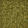 A close-up view of dried parsley flakes.