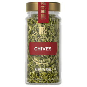 A jar of McCormick Chives, a dried herb used for flavoring dishes.