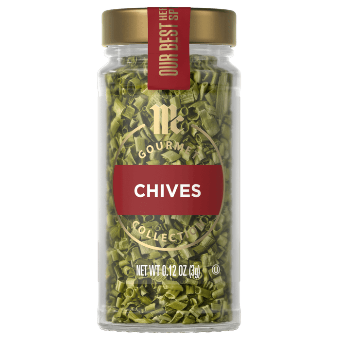 A jar of McCormick Chives, a dried herb used for flavoring dishes.
