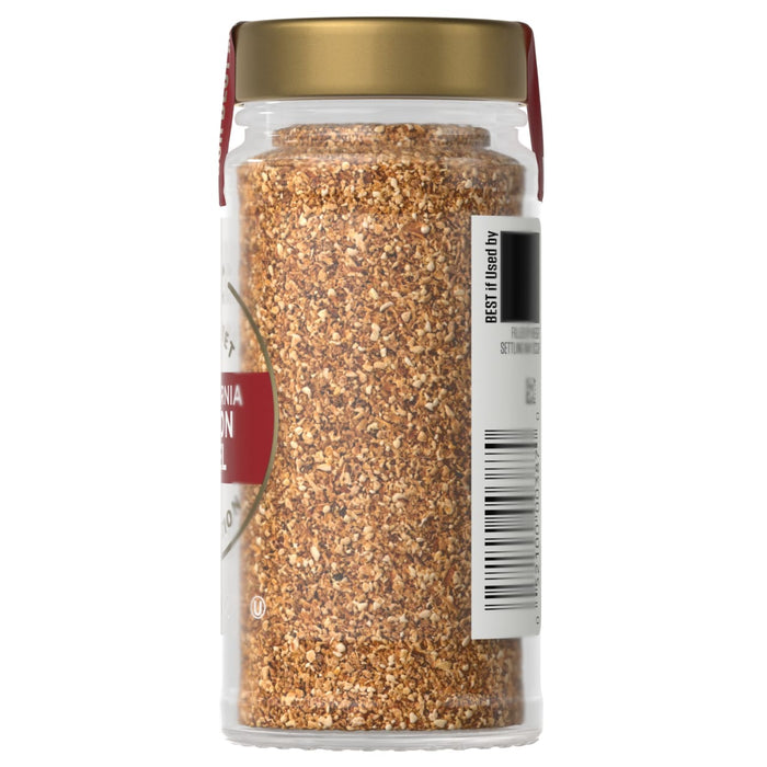 A jar of McCormick Montreal Steak Spice is shown, likely used for seasoning meat.