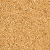 A close-up view of coarse, golden-colored sand.