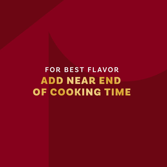 The image displays text on a red background advising to add the product near the end of cooking time for best flavor.
