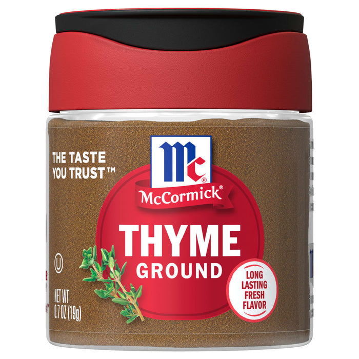 A jar of McCormick Thyme Ground spice.
