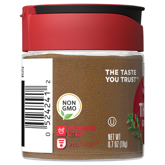 A glass jar of McCormick Grill Mates Montreal Steak Seasoning with a red lid.