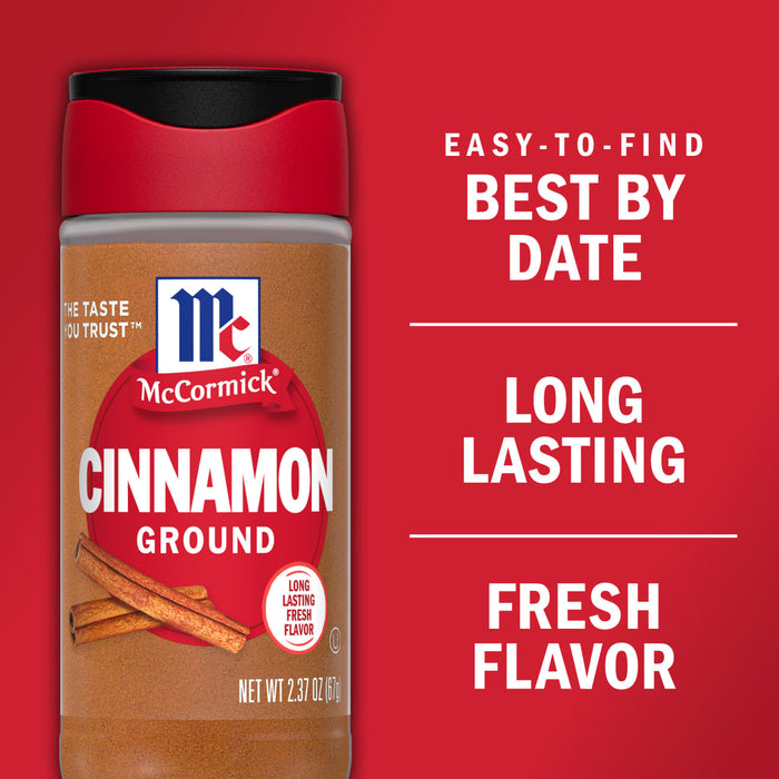 A McCormick Cinnamon Ground spice jar with a red lid and a white label with the McCormick logo and the words Cinnamon Ground in bold.