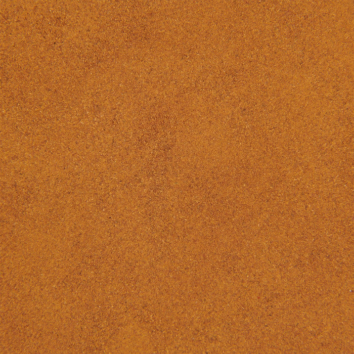 A close-up of a brown, grainy surface.