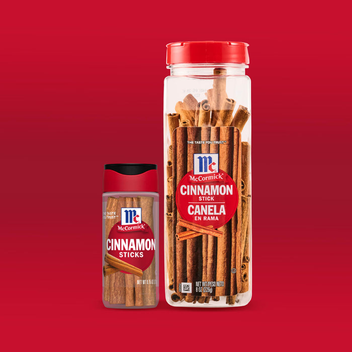 Two containers of McCormick Cinnamon Sticks are displayed against a red background.