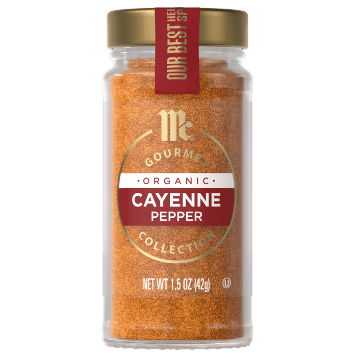A jar of McCormick Gourmet Organic Cayenne Pepper.