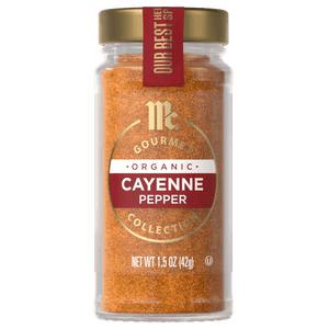 A jar of McCormick Gourmet Organic Cayenne Pepper.
