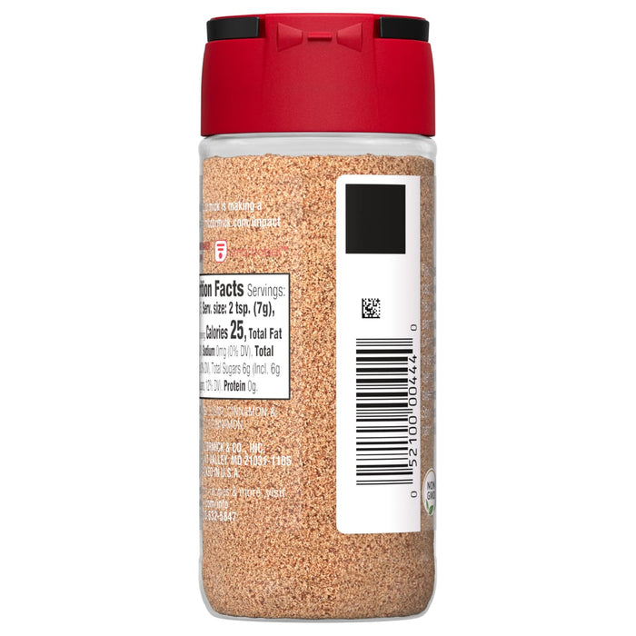 A McCormick Cinnamon Sugar shaker with nutrition facts and barcode.