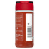 A glass jar of McCormick Paprika with a red lid.
