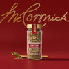 A jar of McCormick Italian Seasoning is displayed against a red background with the McCormick logo in gold script.