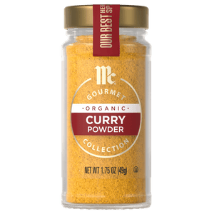 A jar of McCormick Gourmet Organic Curry Powder.