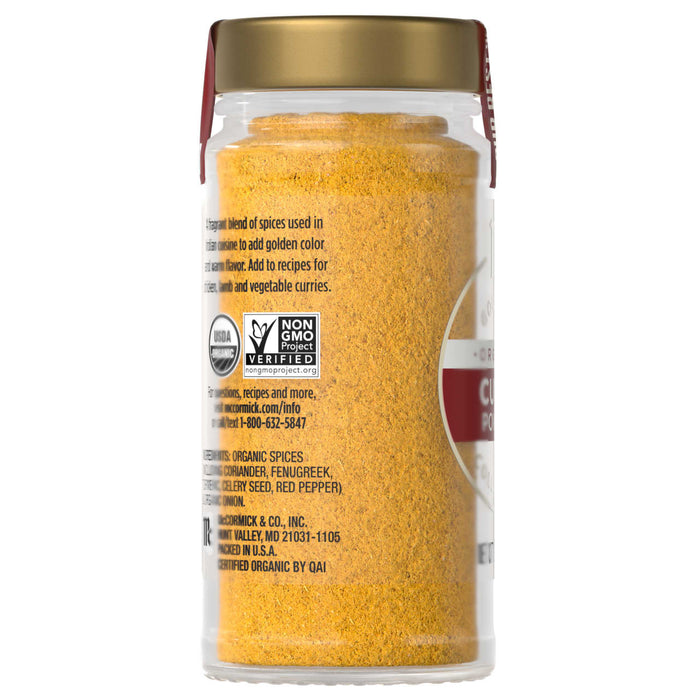 A jar of McCormick Organic Turmeric is shown, highlighting its vibrant color and organic certification.