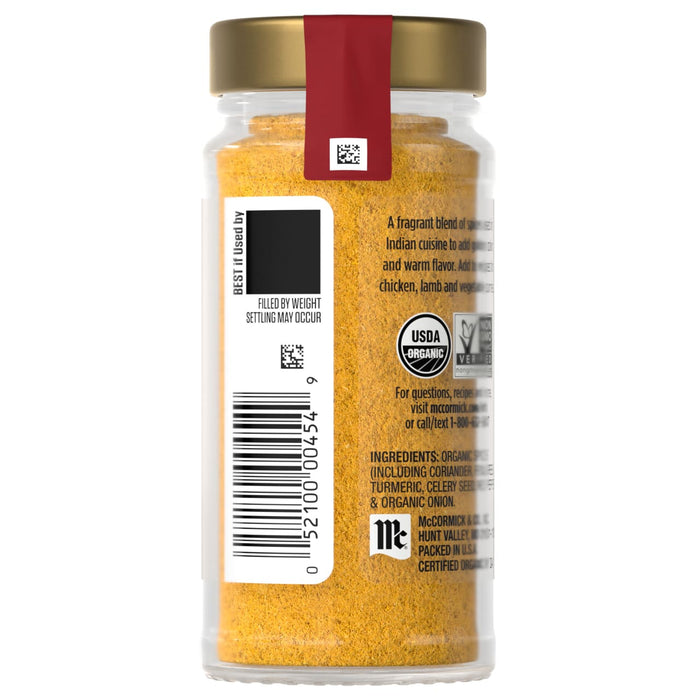 A jar of McCormick organic ground turmeric is shown with its label and barcode.