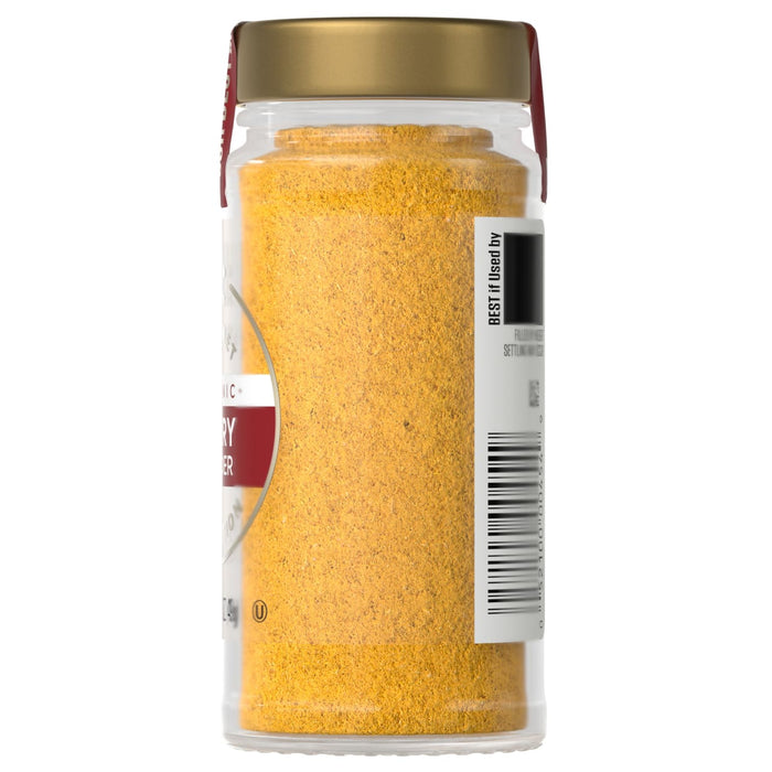 A jar of McCormick ground mustard is shown, highlighting its color and texture.