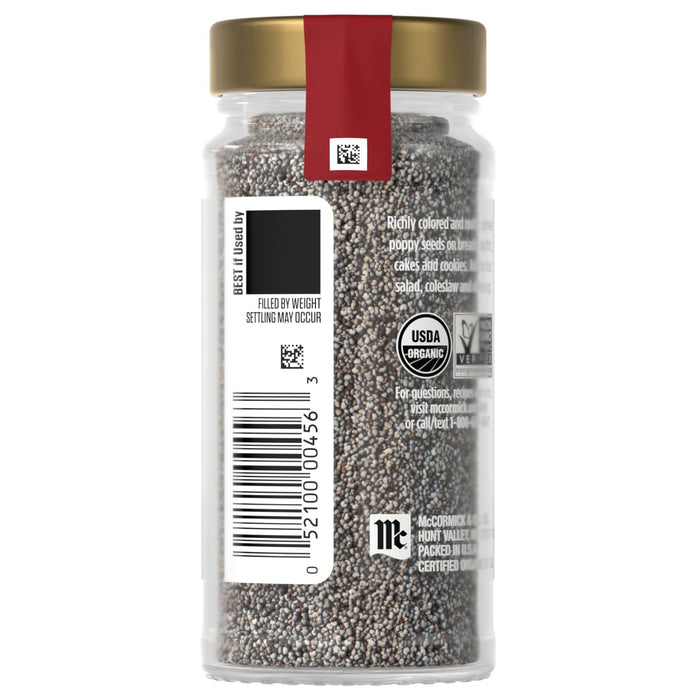 A jar of McCormick Organic Black Pepper with a gold lid and red label.