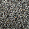 A close-up view of a dense collection of poppy seeds.