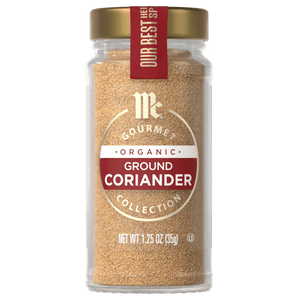 A jar of McCormick Organic Ground Coriander spice.