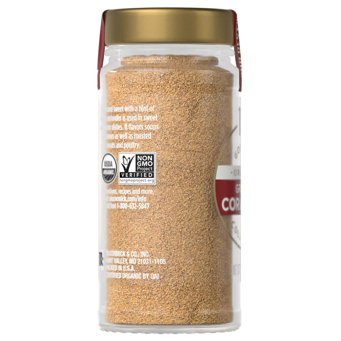 Side view of a McCormick Organic Ground Coriander container.