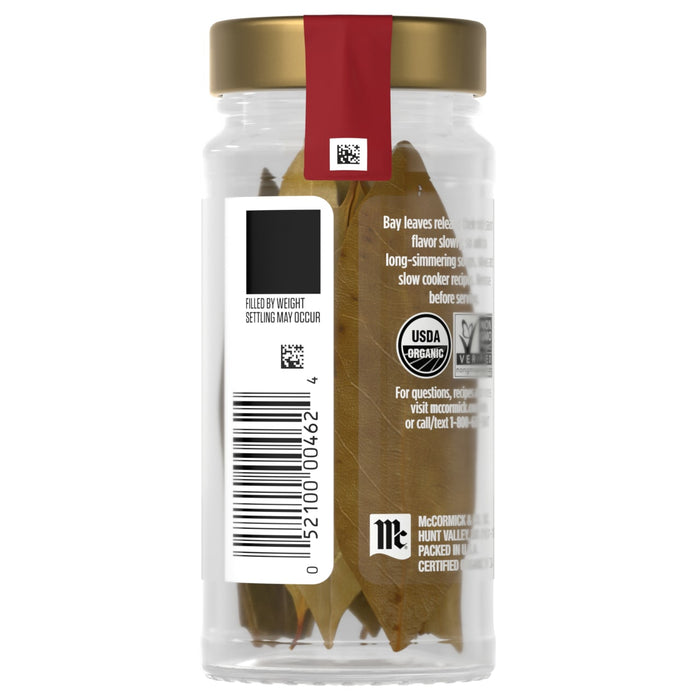 A jar of McCormick Organic Bay Leaves with a label indicating it is USDA organic and filled by weight.