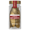 A jar of McCormick Gourmet Organic Turkish Bay Leaves is displayed, showcasing the products branding and contents.
