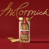A jar of McCormick Bay Leaves is displayed against a red background with the McCormick logo in gold.