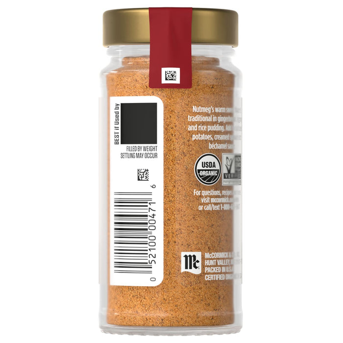 A jar of McCormick Organic Very Good Chicken spice blend with a gold lid and red label.