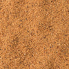 A close-up view of reddish-brown sand.