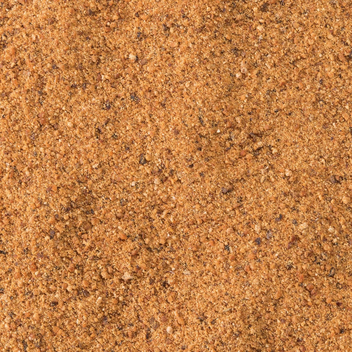 A close-up view of reddish-brown sand.