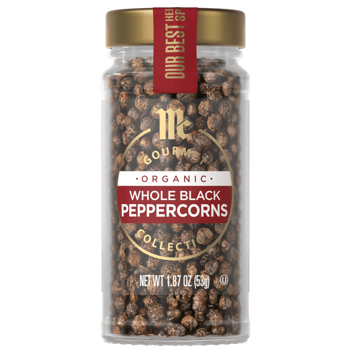 A jar of McCormick Organic Whole Black Peppercorns.