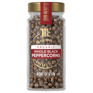 A jar of McCormick Organic Whole Black Peppercorns.