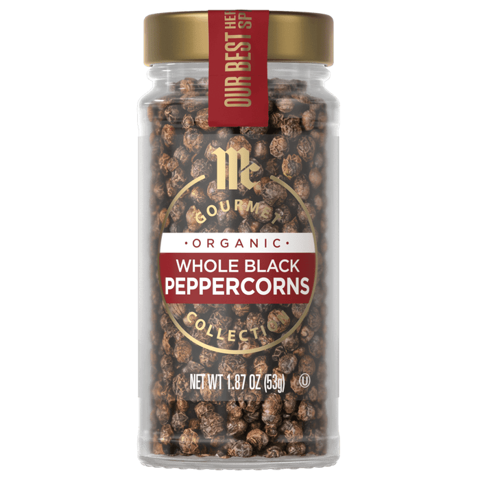 A jar of McCormick Organic Whole Black Peppercorns.