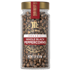 A jar of McCormick Organic Whole Black Peppercorns.