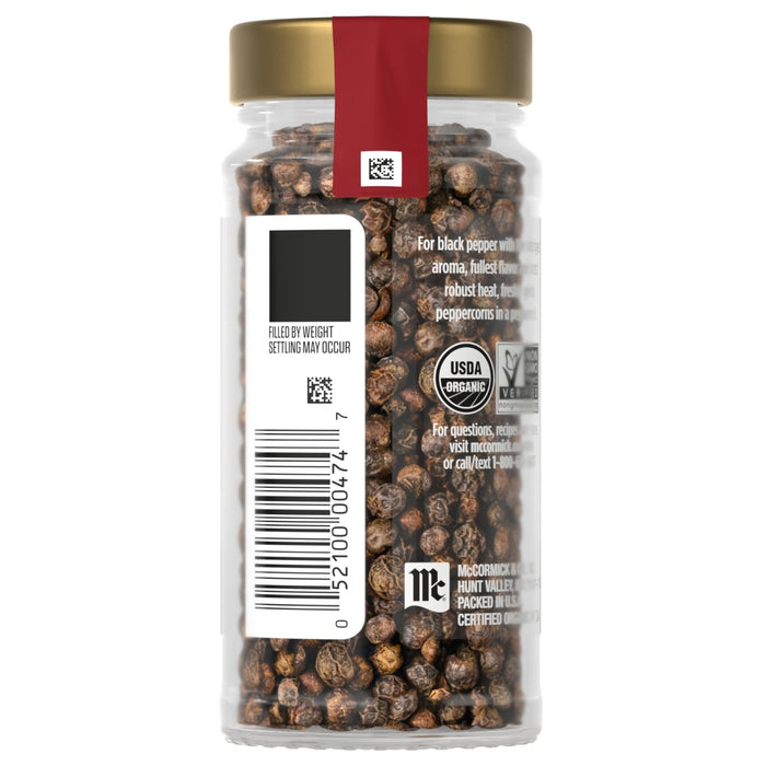 A jar of McCormick Organic Whole Cloves is shown with its label and barcode.