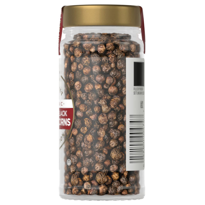 A jar of McCormick Black Peppercorns is shown, highlighting the product's appearance and packaging.