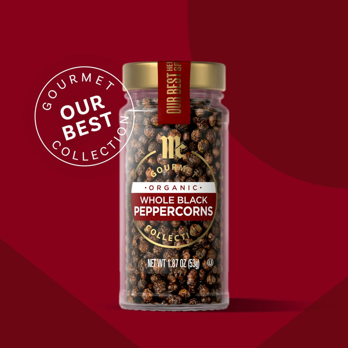 A jar of McCormick Gourmet Whole Black Peppercorns, part of their Our Best Collection.