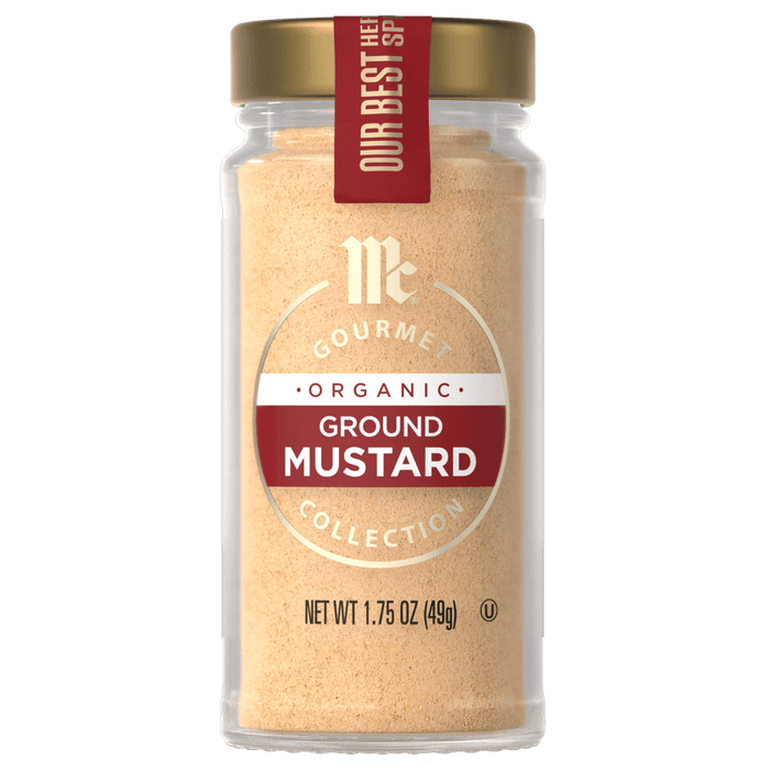 A jar of McCormick Organic Ground Mustard is displayed.